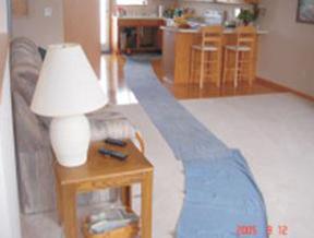 Clearing a drain in a residential house, blue roll rugs layout to keep things clean